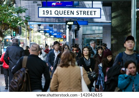 AUCKLAND - MAY 29:Asian people in Queen street on May 29 2013.In 2011, of every 100 Aucklanders, 22 of them are of Asian decent and by 2021, Auckland is expected to have 27% people of Asian decent.