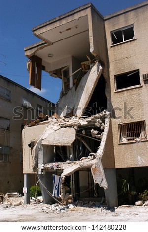 HAIFA, ISR - JULY 21:Bombed-out building that was struck by a Katyusha rocket fired from south Lebanon by Hezbollah on July 21, 2006.In the conflict 165 Israelis where killed and 500,000 displaced.