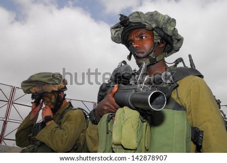 BEERI, ISR - APR 16:Israeli soldiers near Gaza strip on Apr 16  2008.The IDF is one of Israeli most prominent social institution, influencing the country\'s economy, culture and political scene.