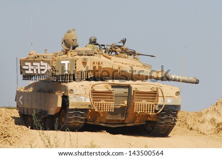 NACHAL OZ, ISR - JUNE 07: Merkava tank on JUNE 07 2009. It\'s IDF battle tank used designed for rapid repair of battle damage, survivability, cost-effectiveness and off-road performance.