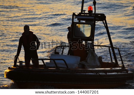 ASHKELON, ISR - NOV 05:Israeli water police looks for a man lost at sea on Nov 05 2009.It\'s responsible for enforcing laws relating to water traffic,search and rescue and preventing crime on vessels.