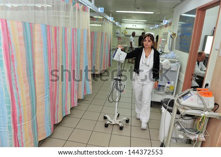 ASHKELON, ISR - JULY 14:Nurse on duty in Barzilai medical center emergency department on JULY 14 2011. The emergency departments of most hospitals in the world operate 24 hours a day.