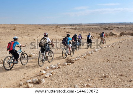 Negev,Isr - May 31:People Cycle In The Negev Desert On May 31 2009.Various Peoples Have Lived In The Negev Since The Dawn Of History Such As:Nomads, Canaanites, Nabateans And Israelis.