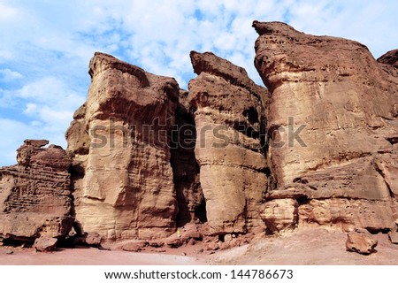TIMNA, ISR - OCT 15:Visitor at Solomon\'s pillars on October 15 2008.The red Sandstone cliffs in Timna Valley called after King Solomon\'s Pillars at the first Jewish Temple in Jerusalem,Israel.