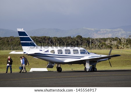KAITAIA, NZ - JULY 08:Passengers traveled by business jet airplane on July 08 2013.There are 17,721 business jets in the worldwide fleet at the end of 2011 with about 70% of the fleet in North America