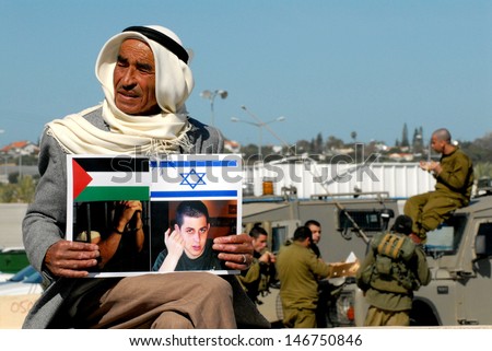 EREZ CROSSING, JAN 11:Arab Israeli man protest on Feb 11, 2010. The group call Hamas to release captured Israeli soldier Gilad Shalit in return for the exchange of Palestinian prisoners in Israel.