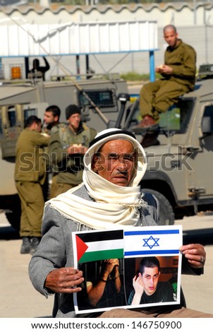 EREZ CROSSING, JAN 11:Arab Israeli man protest on Feb 11, 2010. The group call Hamas to release captured Israeli soldier Gilad Shalit in return for the exchange of Palestinian prisoners in Israel.