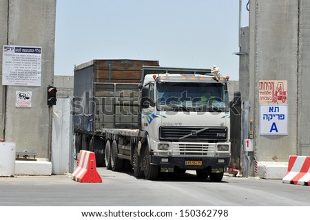KEREM SHALOM, ISR - JUN 21:Truck full of goods to Gaza strip on Jun 21 2010.Since 2010, NIS 75M been invested to upgrade the crossing, which is capable of handling 450 trucks a day.