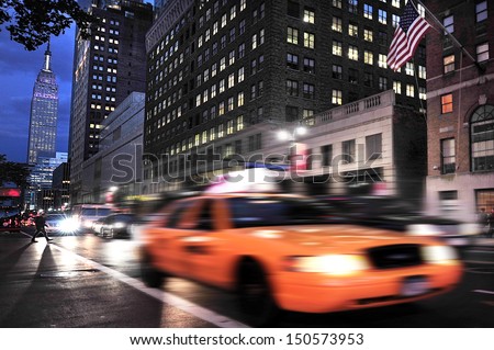 NEW YORK - OCT 15:Traffic under the Empire State Building on Oct 15 2009.It stood as the world\'s tallest building since 1931 until the World Trade Center\'s North Tower was completed in 1972.