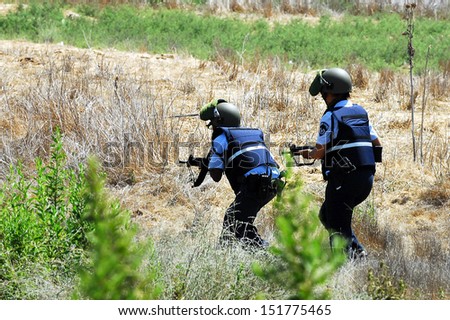 ASHKELON, ISR - SEP 10:Israeli police forces simulate a bomb truck attack in Israel on September 10 2008.The Israel Police are a professional force, with some 35,000 persons on the payroll.