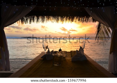 Romantic dinner for two on the beach of Pacific Island.