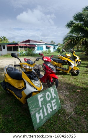 AITUTAKI - SEP 20:Motorbikes for hire on Sep 20 2013.It\'s one of the must popular activity in the Island but Cook Islands Driver\'s License is required to operate a motorized rental.