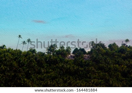 AITUTAKI - SEP 16:Aerial view of small tropical island in Aitutaki Lagoon, Cook Islands on Sep 16 2013. There are no snakes and no poisonous insects or animals on the Cook Islands.