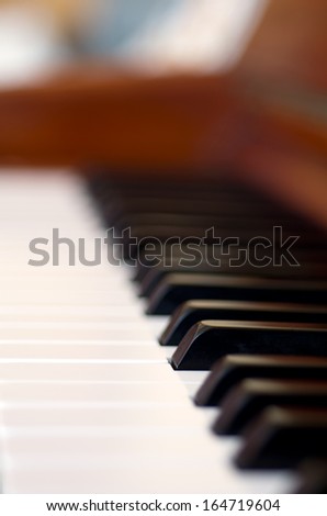 Piano keys close side view.