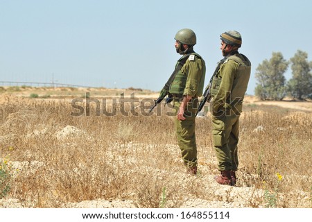 KEREM SHALOM, ISR - JULY 05:Israeli soldiers near Gaza strip on July 05 2010.IDF is one of Israeli society\'s most prominent institutions, influencing the country\'s economy, culture and political scene