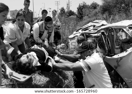 ASHKELON, ISR - JUNE 08:Injured person in a deadly car accident on June 08  2008.According to the World Health Organization:1.2M people are killed in traffic accidents each year around the world (BW)