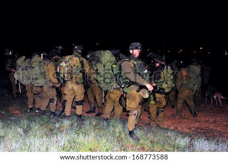 NACHAL OZ, ISR - JAN 03:Israeli soldiers during the  first land incursion into Gaza strip  during cast lead operation on Jan 03 2009.