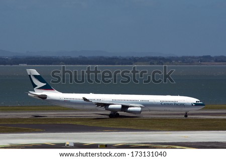 AUCKLAND - DEC 31:Cathay Pacific Airbus A340 on Dec 31 2013. In 2010, Cathay Pacific became the world\'s largest international cargo airline.