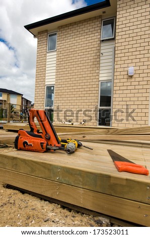 AUCKLAND,NZ - JAN 11:Working tools in new homes building site on JAN 11 2014.House prices are booming around New Zealand - with the average price of an Auckland city home rocketing to $735,692