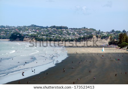 OREWA, NZ - JAN 02: Orewa beach on Jan 02 2014.It\'s a popular holiday destination and one of the most expensive areas in which to buy a house in New Zealand.