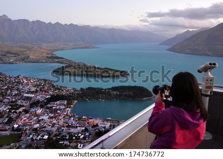 QUEENSTOWN, NZ - JAN 17:Visitor in Queenstown on Jan 17 2014.It\'s one of the most popular travel destination in New Zealand known for it\'s restaurants, ski tourism and extreme sport adventure.