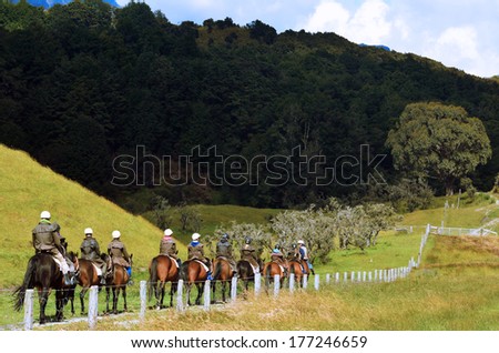 GLENORCHY, NZ - JAN 13:Horse Riding on Jan 13 2014 in Glenorchy, NZ.It\'s a popular travel destination in NZ and it was used as one of the settings in Peter Jackson\'s Lord of the Rings films.