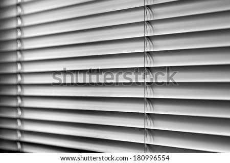 Venetian blinds, close up image as background.  (BW)