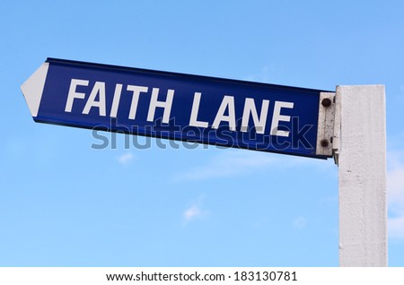 Faith Lane text on road sign against blue sky background. Concept photo of faith,love,hope, religion,spiritual,freedom,worship,help, heaven, believe, religious lifestyle,.