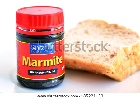 AUCKLAND, NZ - MAR 31 2014:A jar of Marmite produced by Sanitarium Health and Wellbeing Company.It\'s on of the  top-seller in the Australian and New Zealand breakfast food market.