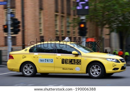 MELBOURNE, AUS - APR 13 2014:13CAB in motion. 13CABS is a major taxi cab Network Service Provider (NSP) based in Melbourne, Australia.