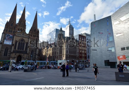 MELBOURNE - APR 13 2014:Visitors at the Federation Square.It located at the heart of MelbourneÃ?Â??s CBD with size of an entire city block.It\'s home to major cultural attractions and world-class events.