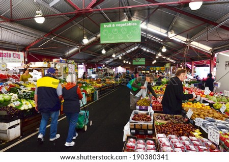 MELBOURNE, AUS - APR 12 2014: Shoppers at Queen Victoria Market. It is a major landmark and the largest open air market in the Southern Hemisphere.