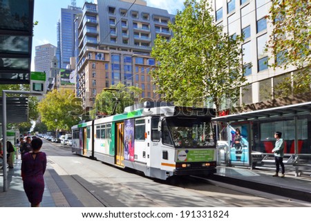 MELBOURNE, AUS - APR 13 2014:Melbourne tramway on Collins St.It\'s the largest urban tramway network in the world, consisted of 250 km (155.3 mi) of track, 487 trams, 30 routes and 1,763 tram stops