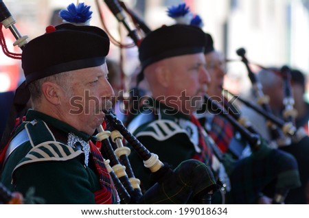 AUCKLAND,NZ - JUNE 01 2014:Pipe band celebrate the Queen\'s Birthday on the first Monday of June each year as the Queen of the United Kingdom being the head of state.