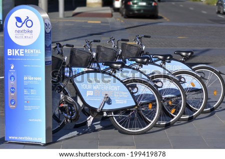 AUCKLAND - JUNE 01 2014:Auckland waterfront bike hire.Many cities around the world have bicycle sharing systems or community bicycle programs.The first was the White Bicycle plan in Amsterdam in 1965.