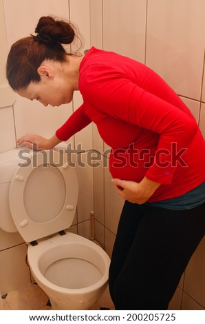 Pregnant woman having morning sickness during Pregnancy. Concept photo of pregnancy, pregnant woman lifestyle and health care.copyspace