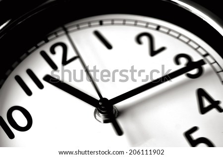 Time passing over the face of home office Wall Clock. Concept photo of time, timming,business, busy,deadline.