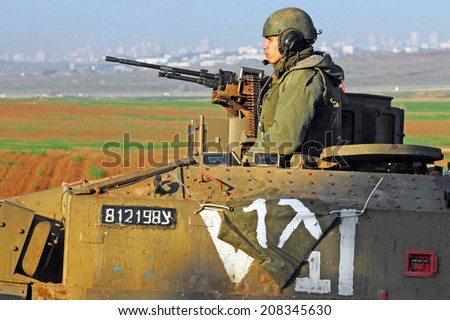 NACHAL OZ - JUNE 07 2008:A moving heavily armored personnel carrier (M-113) It\'s US Made since 1960 and it\'s the most common armored personnel carrier in the world.