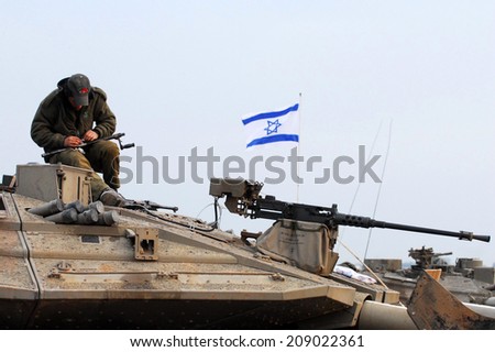 GAZA STRIP - JAN 16 2009: The first Israeli troops leaving Gaza Strip after Cast Lead operation. It was a three-week armed conflict in the Gaza Strip during the winter of 2008-2009.