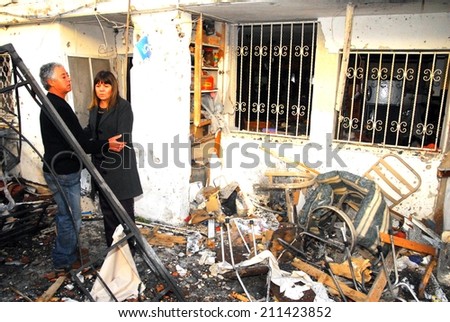 SDEROT, ISR - MAR 03 2008:Palestinian rocket hits Israeli house.Since 2001 over 15,000 rockets hit Israel killed 28 injured 1900 people widespread psychological trauma and disruption of daily life.