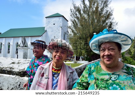 RAROTONGA - SEP 16 2013:Cook Islanders women come out the CICC church after Sunday service.The dominant religion in the Cook Islands is Christianity since the first missionaries arrived in 1821.