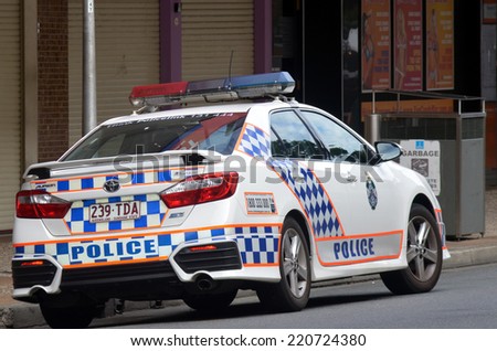 BRISBANE, AUS - SEP 25 2014:Queensland Police car patrol.Gold Coast police on high terror alert warned to be hyper vigilant and patrol local mosques and critical infrastructure sites