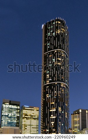 BRISBANE, AUS - SEP 25 2014:Infinity Tower, Brisbane at night.The Infinity Tower is a 249-metre (817 ft) skyscraper by Meriton.Infinity Tower is the tallest building in Brisbane today.
