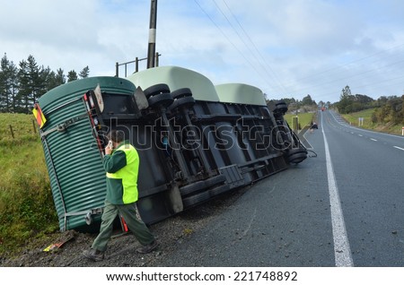 AUCKLAND , NZL - SEP 22 2014: Truck accident during high winds storm in New Zealand.Truck companies require to advise their truck drivers to use extreme caution when driving under adverse conditions.