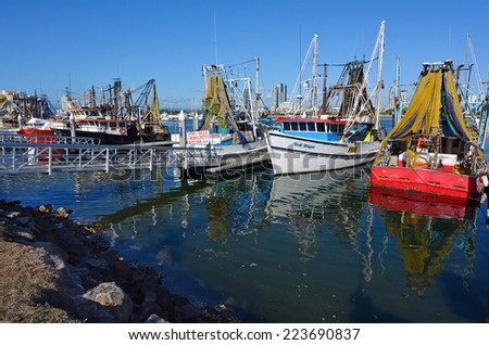 GOLD COAST, AUS - OCT 13 2014:Fishing trawlers mooring at Gold Coast Fishermen\'s Co-Operative.Since 2008 the Gold Coast fishermen selling their catch direct to the public from the boat at low price.