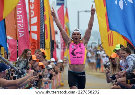 COOLANGATTA, AUS - NOV 2 2014:Josh Minogue wins Coolangatta Gold 2014.He announced he would hang up Speedo after the 41.8-kilometre race but it turns to be it\'s first win in the elite race.