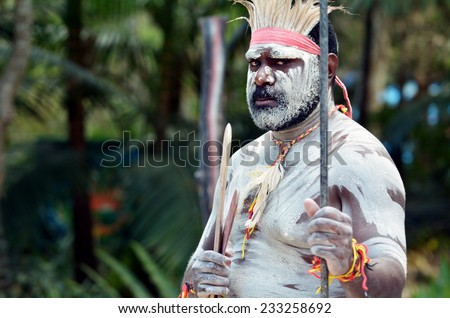 Portrait of one Yugambeh Aboriginal warrior man preform Aboriginal culture martial art during Aboriginal cultural show in Queensland Australia Portrait of one Yugambeh Aboriginal warrior man preform Aboriginal culture martial art during Aboriginal cultural show in Queensland Australia