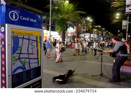SURFERS PARADISE - NOV 15 2014:Visitors in Cavill Avenue Surfers Paradise CBD at night.It\'s Australia\'s iconic coastal tourist destinations drawing 10 million tourists a year from all over the world.