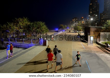SURFERS PARADISE - NOV 15 2014:Visitors in surfers paradise esplanade at night.It\'s Australia\'s iconic coastal tourist destinations drawing 10 million tourists a year from all over the world.