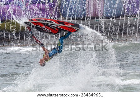 GOLD COAST, AUS -  NOV 06 2014:Jet Stunt Extreme Show in Sea World Gold Coast Queensland Australia.It\'s produced by Jon Cooke Entertainment and features some of the world\'s best jet ski performers.